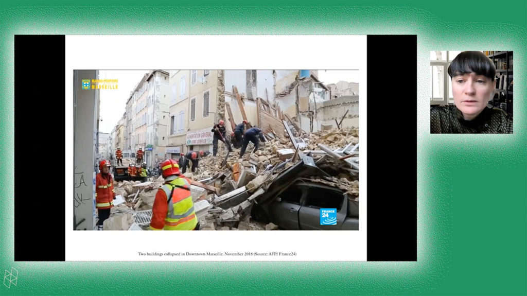 Screenshot from a virtual event. Charlotte Malterre-Barthes appears in a small square on the right. A larger rectangle contains her PowerPoint presentation, which shows workers surrounding and climbing on a pile of debris. Charlotte and her PowerPoint are surrounded by a bright green background.