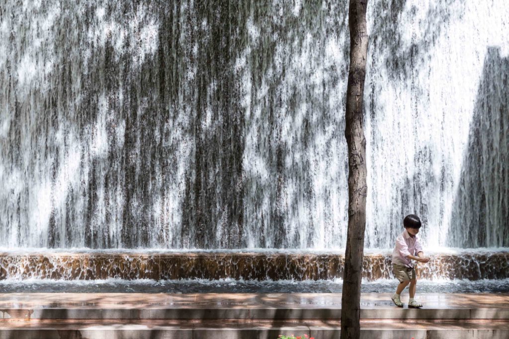 Young child playing in water