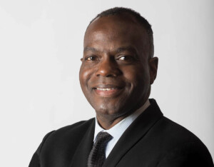 Headshot of Milton Curry.