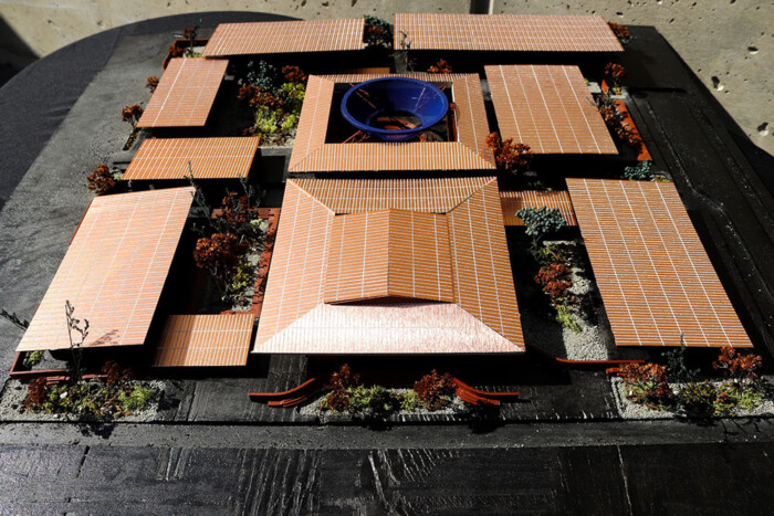 A model of a large library and cultural center, viewed from overhead.