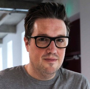 Headshot of David Sheldon-Hicks