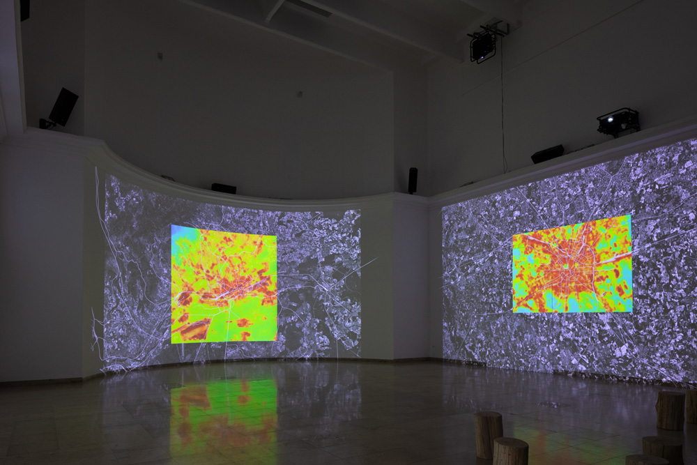 Large heat maps projected on walls.