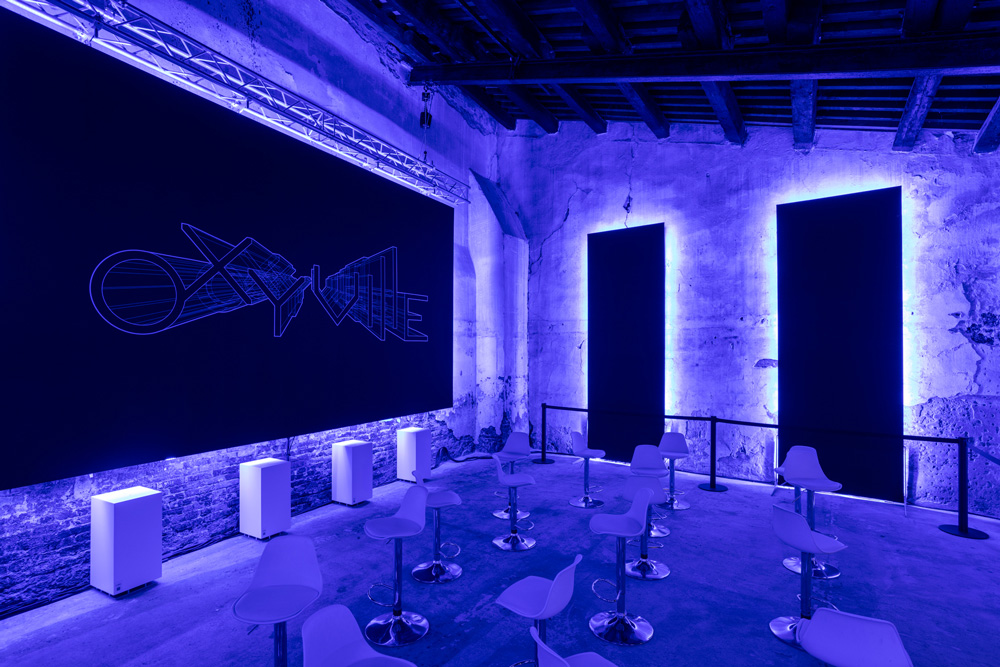 Blue lighting accents in industrial looking room.