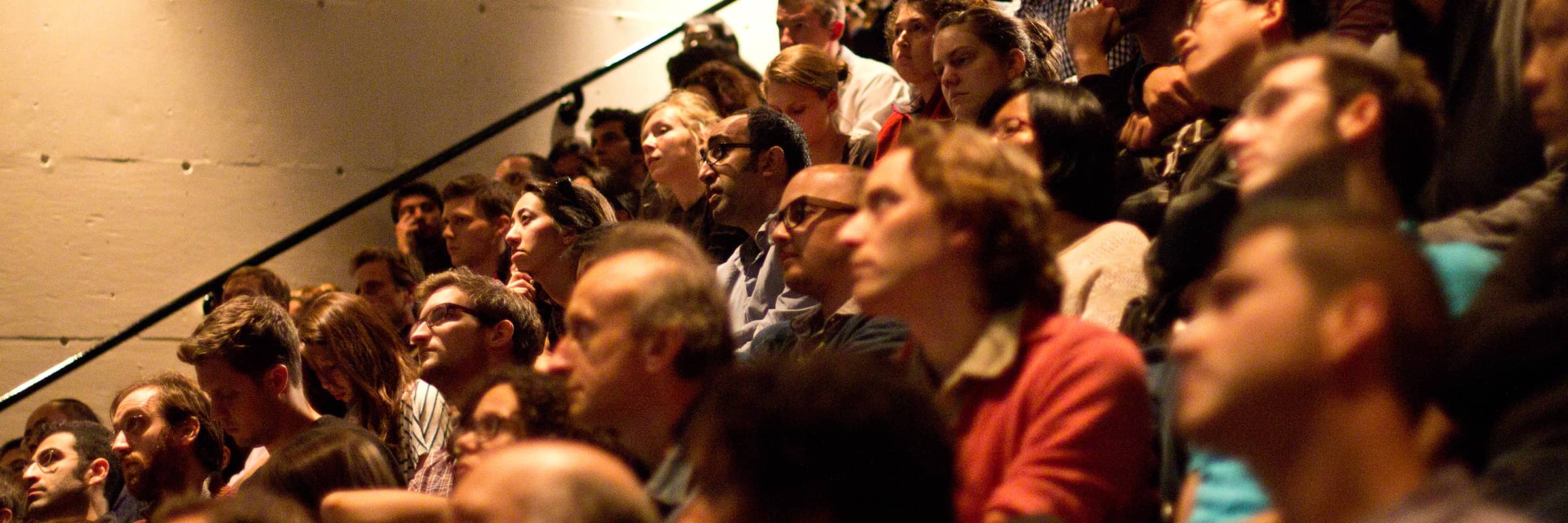 Seated audience during a seminar.